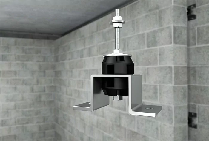 PSB-M sound isolating resilient wall brace supporting a CMU concrete block wall.