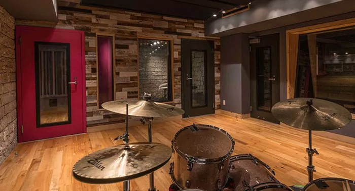 Full glass STC rated QuietSwing doors with sidelites in a recording studio live room