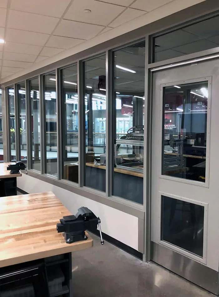 QuietLite STC Rated Window with mullions and acoustical door for fabrication lab
