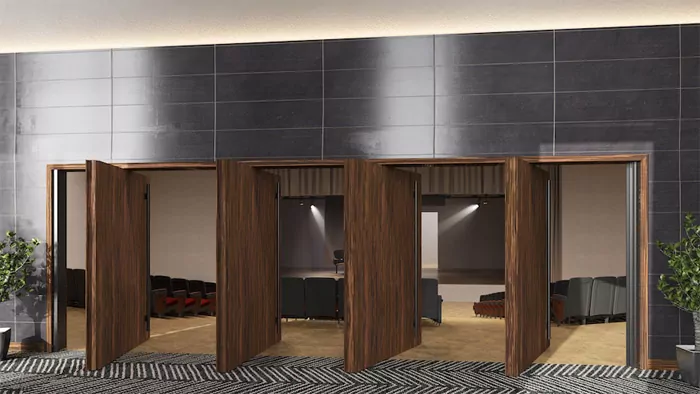 QuietPivot stc rated pivoting doors installed between auditorium and lobby