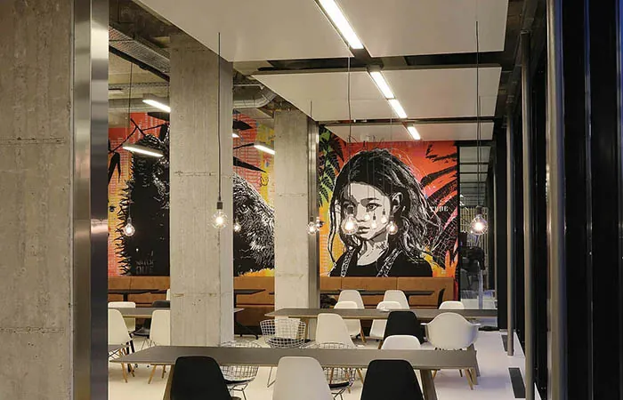 rectangular metal ceiling clouds with integrated lighting in a restaurant