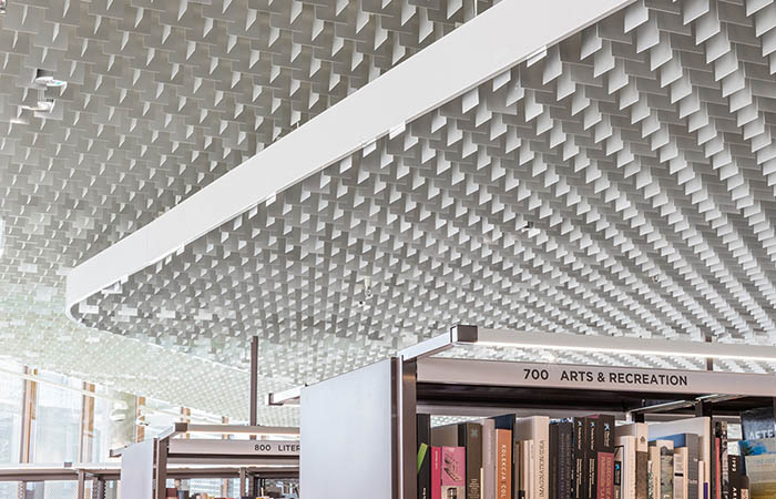 LIVA metal paddle ceiling in a library ceiling.