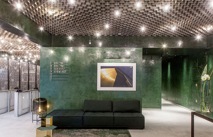 LIVA metal ceiling with integrated point lights in a building lobby.