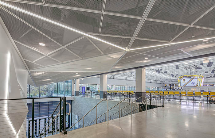 durlum Rhombos expanded metal mesh ceiling in an athletic facility.
