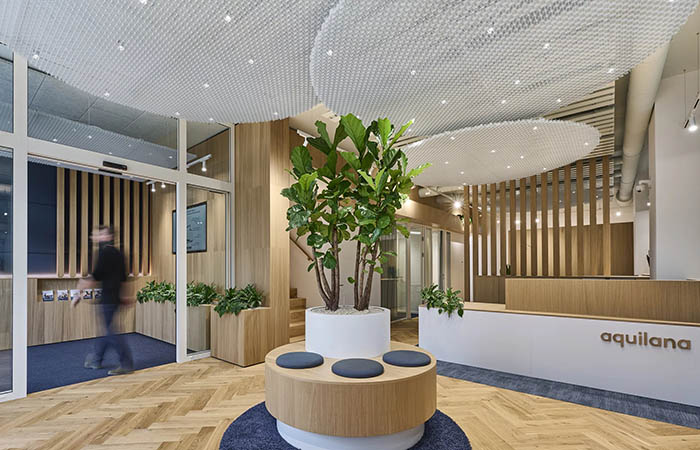 Ticell-N configured in circular clouds above a lobby reception desk