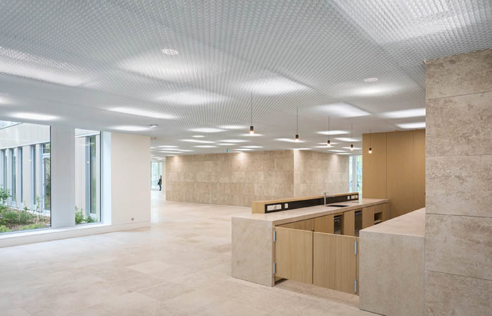 White Ticell-N metal ceiling throughout an open plan office